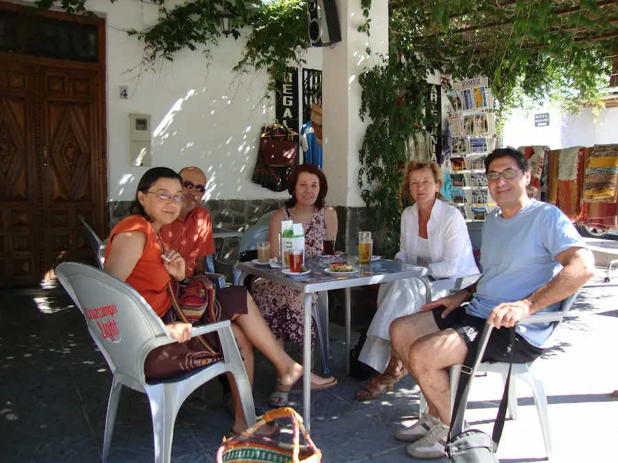 Group of Intercam School of Languages students practicing conversational Spanish on a terrace in La Alpujarra.